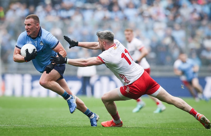 Dublin's Ciaran Kilkenny is challenged by Mattie Donnelly of Tyrone. Photograph: Tom Maher/Inpho