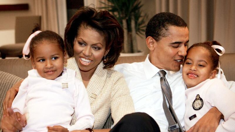 IVF: Michelle and Barack Obama with their daughters, Sasha and Malia, in 2004. Photograph: Scott Olson/Getty