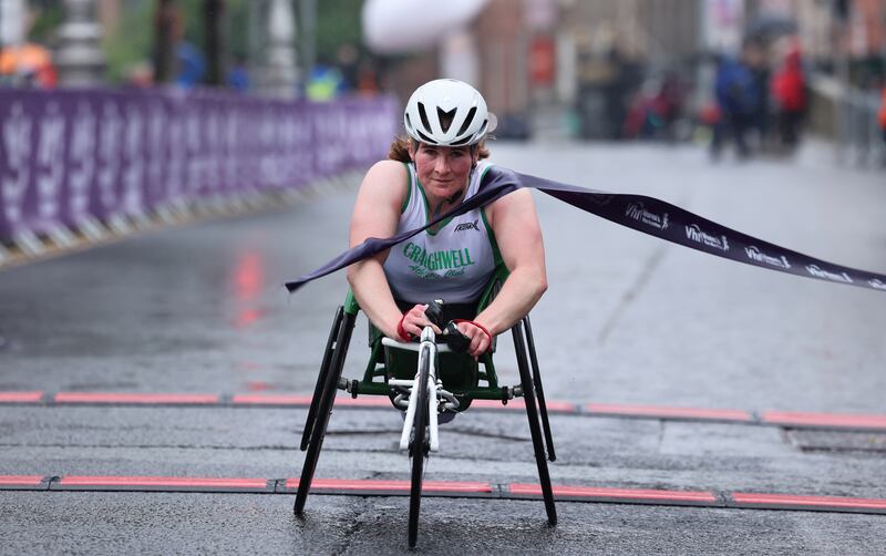 VHI Women’s Mini Marathon participant Shauna Bocquet crossing the finish line in Dublin.
Photograph: Dara Mac Dónaill / The Irish Times








