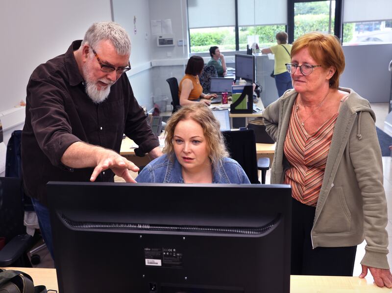 Conal O'Boyle, editor of The Nationalist, with reporters Marie Boran and Elizabeth Lee, at their office in Carlow town. Photograph: Dara Mac Dónaill
