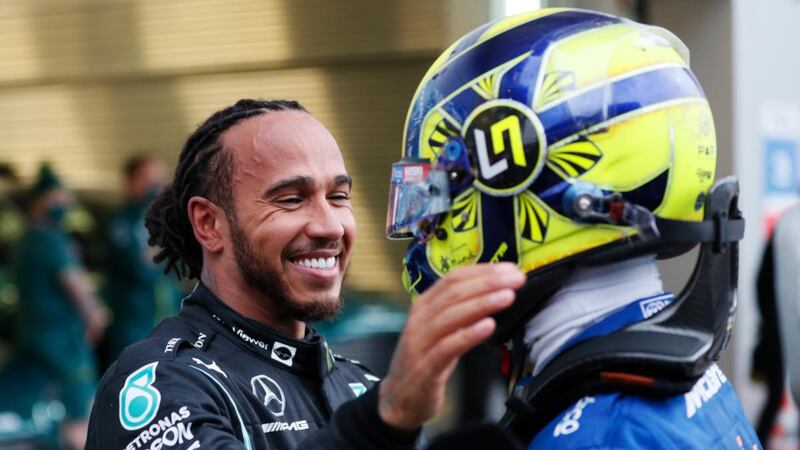 Lewis Hamilton  hugs Lando Norris in parc ferme after the Russian Grand Prix. Photograph: Yuri Kochetkov/Getty Images