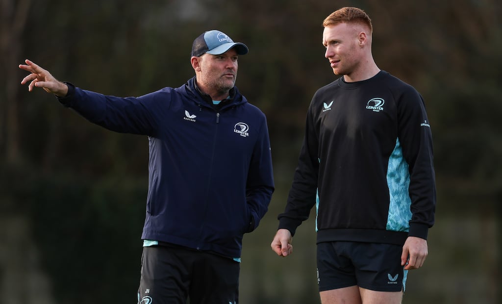 Leinster senior coach Jacques Nienaber with Ciarán Frawley during squad training at University College Dublin. Photograph: Grace Halton/Inpho