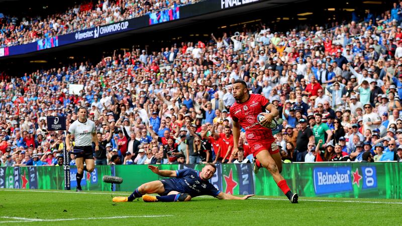 Toulouse’s Matthis Lebel goes past Jordan Larmour of Leinster to scores his side's try. Photograph: James Crombie/Inpho 