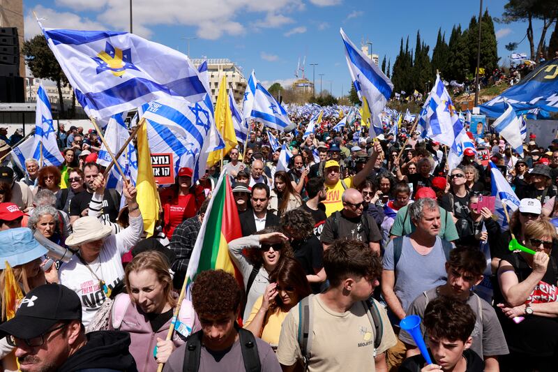 Protesters in Jerusalem on Wednesday demanding an end to Israel's war on Gaza.  Photograph: Menahem Kahana/AFP via Getty Images    