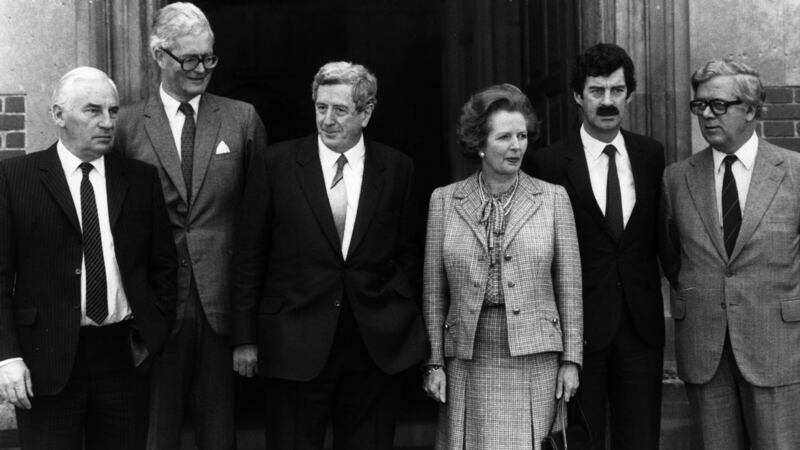 Garret FitzGerald and Margaret Thatcher   with  ministers Peter Barry, Douglas Hurd, Dick Spring and Geoffrey Howe  at an  Anglo-Irish summit  at Chequers, England. Photograph:  Keystone/Getty Images