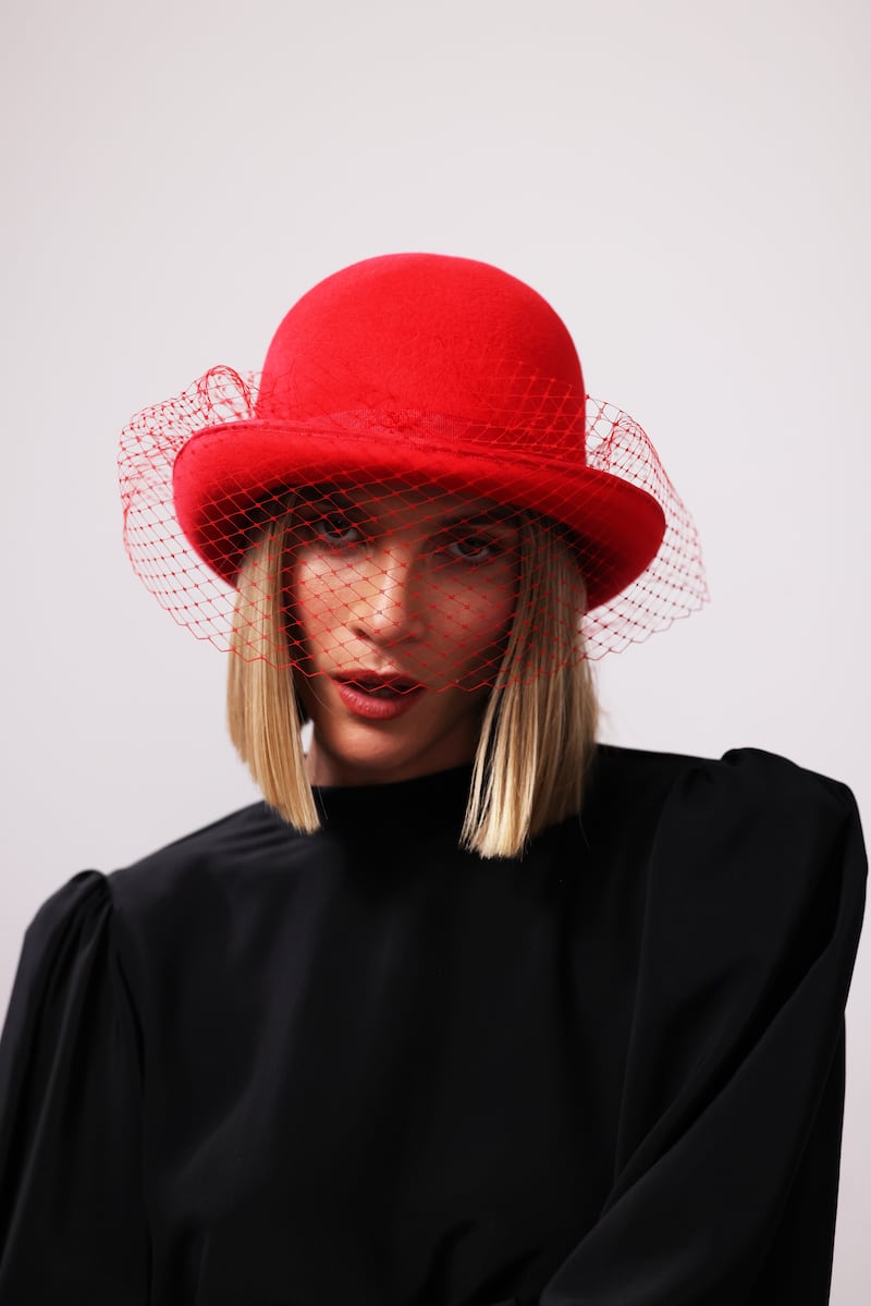 Bright red high top bowler hat, €395, by Wendy Louise Designs