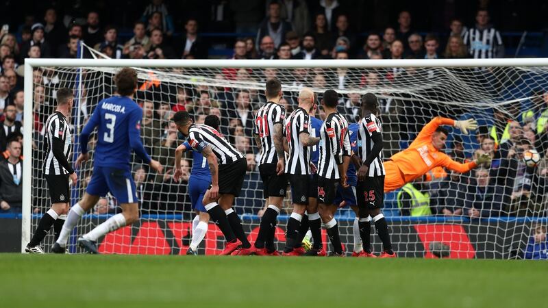 Marcos Alonso scores Chelsea’s third against Newcastle. Photograph: Catherine Ivill/Getty