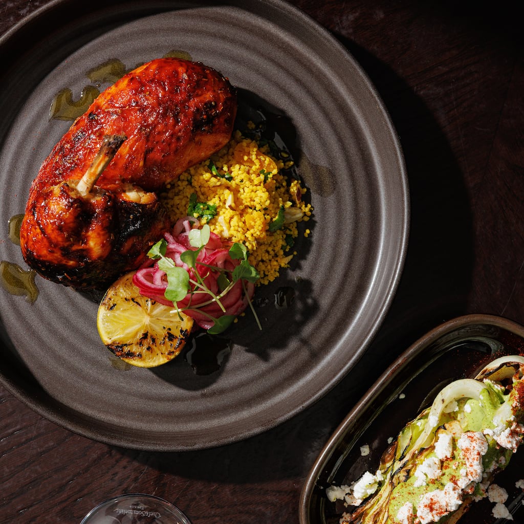 Peruvian roast chicken, on the menu at The Exchange, is slow cooked on an asador grill