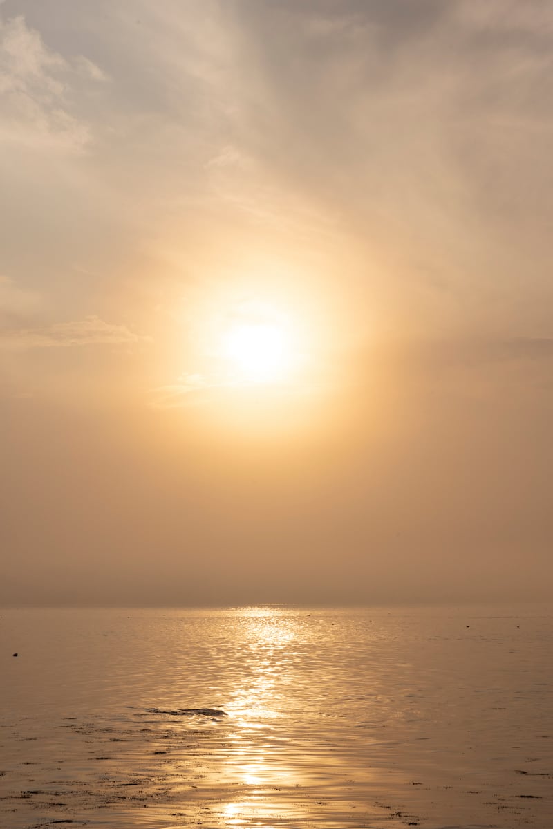 Sunset seen from Duck Ledges Island. Photograph: Greta Rybus/The New York Times
                 