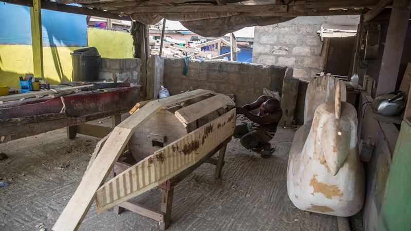 Eric Kpakpo spends weeks making each bespoke coffin. Photograph: Sally Hayden