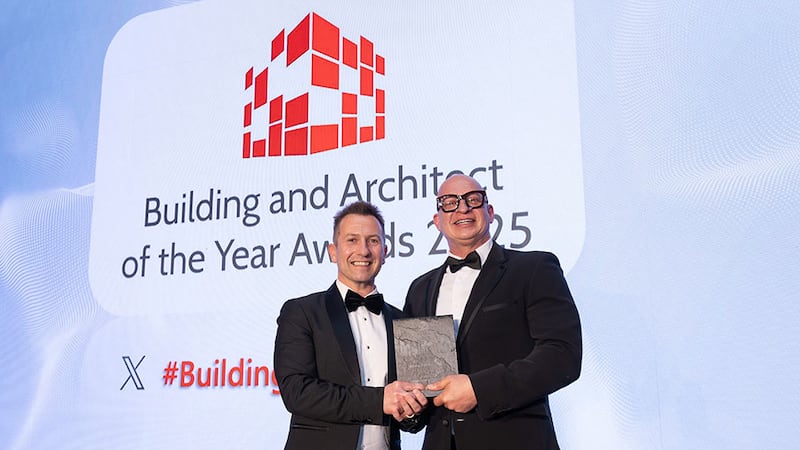 Stephen Pierce, Vescom's Irish agent, presents building of the year - retail award to Gary Cohn, COHN