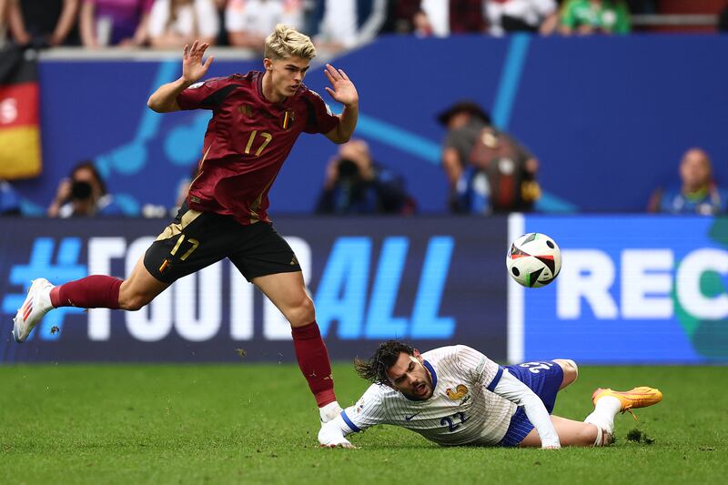 France's defender Theo Hernandez fights for the ball with Belgium's forward Charles De Ketelaere. Photograph: Franck Fife/AFP via Getty