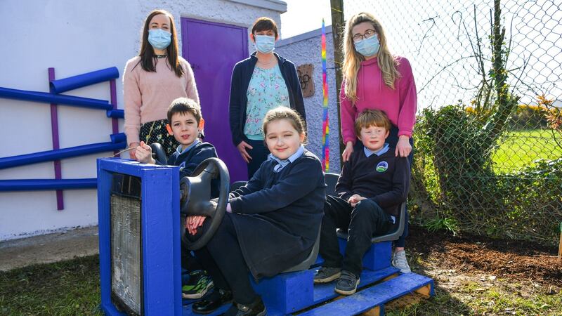 Sonas class students (from left) Alex O’Shea,  Willow Spratt and Aaron Frewen along with (from left) class teacher Maria Murphy and SNAs Joan O’Connor and Ashley Ryan, in the new sensory garden at Anglesboro NS.