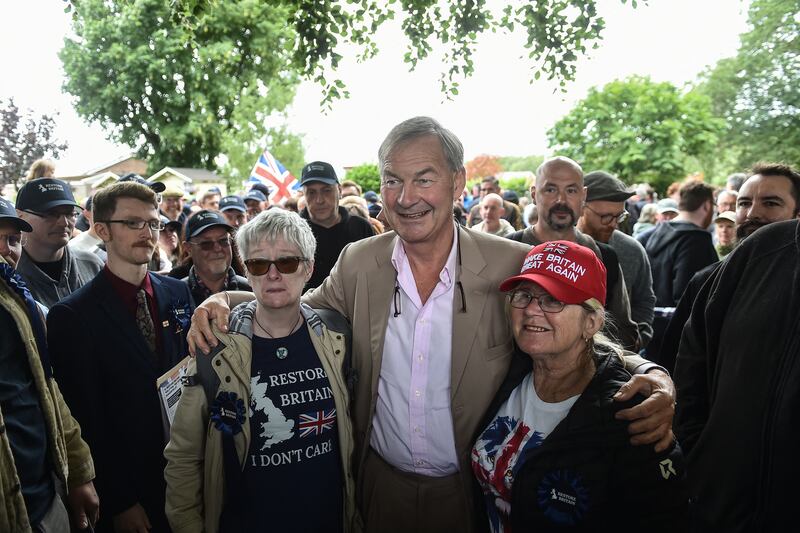 Restore Britain leader Rupert Lowe campaigning on Saturday in the Makerfield constituency in northwest England. Photograph: Peter Powell/ AFP via Getty Images