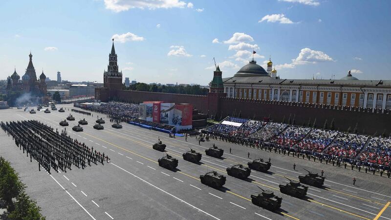 Military vehicles moving through Red Square. Photograph: Mikhail Voskresenskiy/Host photo agency/AFP via Getty Images