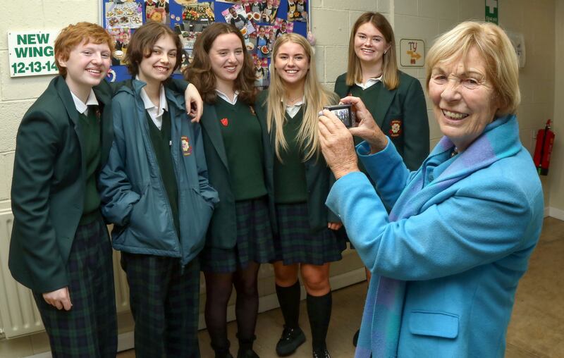 Keen photographer Jane Hogan, former Guidance Counsellor at Salerno Secondary School, taking photographs of students Aoife O’Dea, Siona Hogan, Julie Bohan, Abbey Rae Keane and Fiona Feeney during the celebrations to mark the 60th jubilee of the school in October 2022. Photograph: Joe O'Shaughnessy