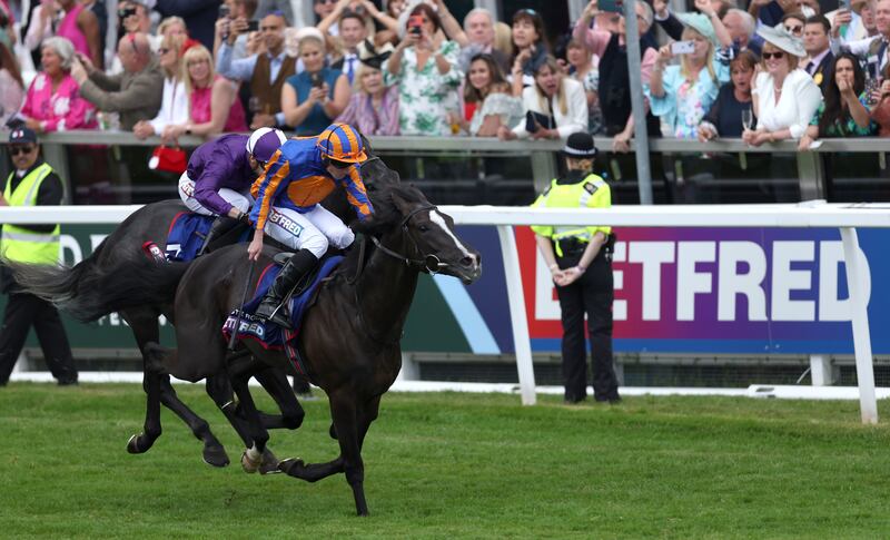 Auguste Rodin ridden by Ryan Moore wins The Betfred Derby at Epsom. Moore has triumphed in big races all over the world including Australia and Hong Kong and Japan. Photograph: Steven Paston/PA Wire for The Jockey Club.