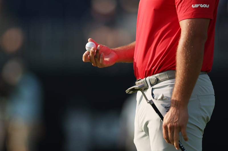 Defending US Open champion Bryson DeChambeau holds his ball. Photograph: Patrick Smith/Getty