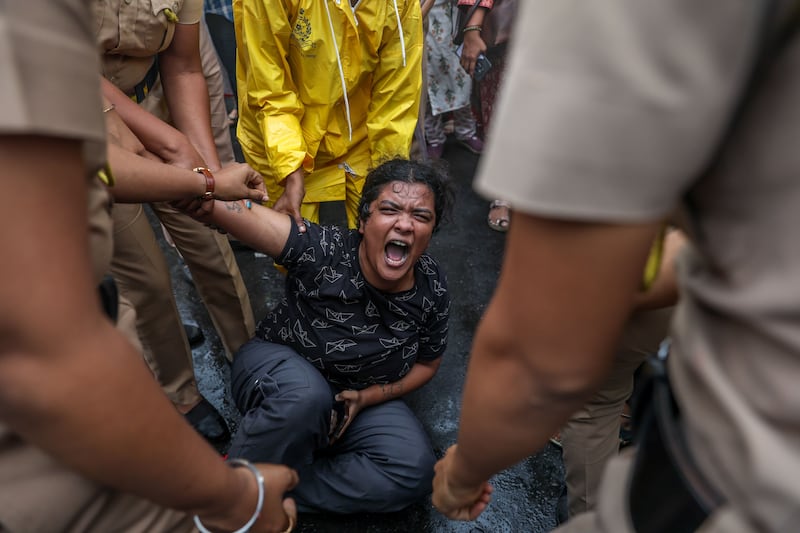 Indian police personnel detain a supporter of the Cockroach Janta Party during a protest in Mumbai, India, on Monday. Photograph: EPA
