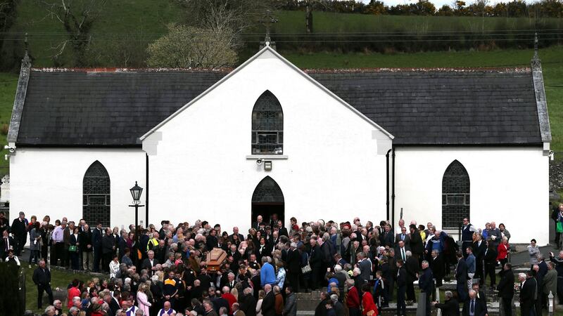 The coffin of Big Tom McBride is taken from Saint Patrick’s Church in Oram, Co Monaghan. Photograph: Brian Lawless/PA Wire