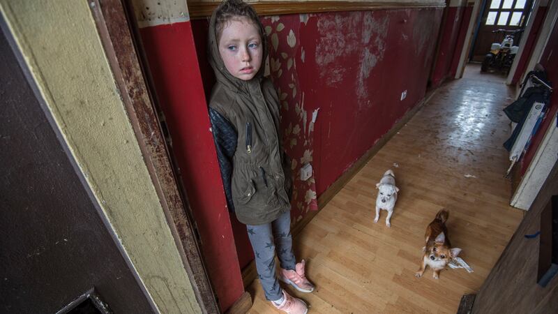 Stacy Sherlock (9) in the house the family can’t live in due to its dampness. Photograph: Brenda Fitzsimons