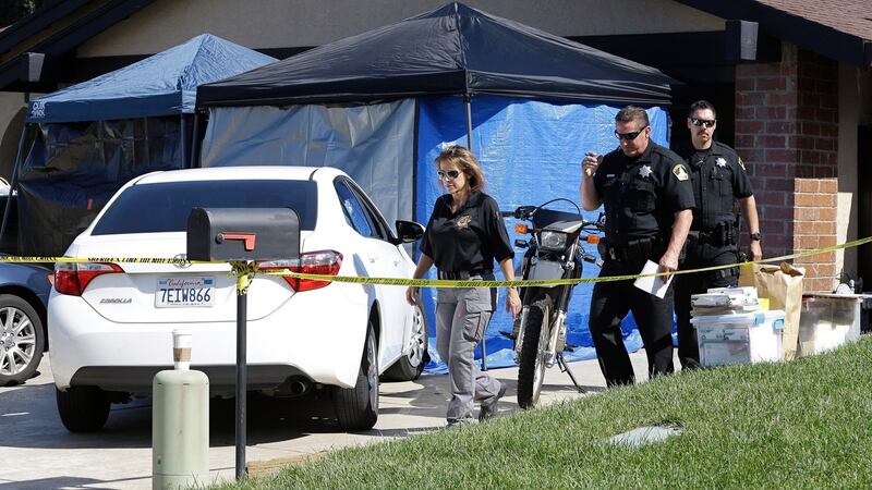 Sacramento County deputies leave the Citrus Heights, California home of Joseph James DeAngelo on  Wednesday after his arrest in connection with at least   12 murders and 45 rapes in California in the 1970s and 1980s. Photograph: Rich Pedroncelli/AP