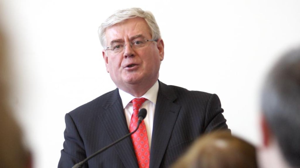 Tanaiste Eamon Gilmore insisted that “no matter how you do the sums” it “does not amount to a 15 per cent rise” in health premiums. Photograph: Paul Faith/PA Wire