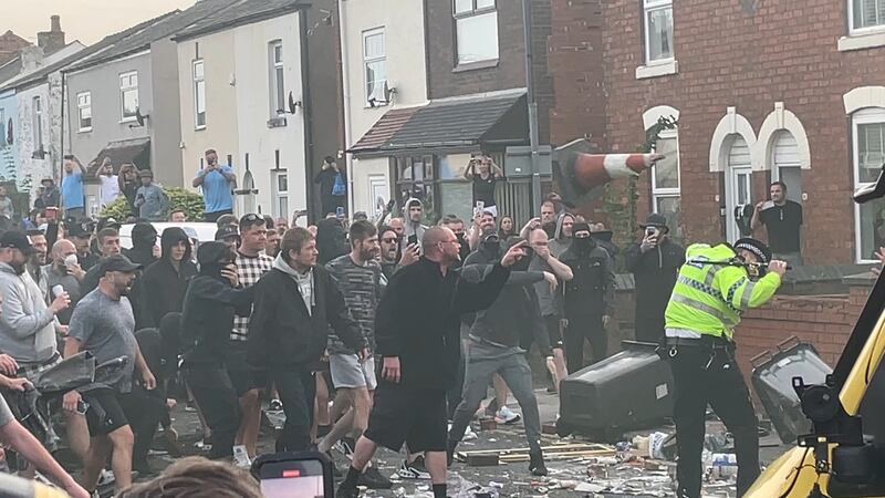 Trouble flares during a protest in Southport after three children died in a 'ferocious' knife attack at a dance school on Monday. Photograph: Richard McCarthy/PA Wire 