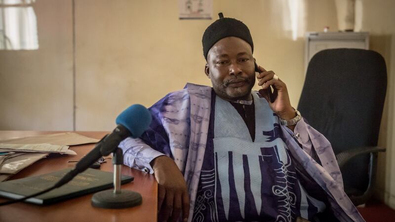 Bello Danbatta in his sparse office in Maiduguri’s disused central post office. He is a spokesman for the Civilian Joint Task Force (CJTF), which chased Boko Haram  out of Maiduguri, armed with sticks, nearly a decade ago. Photograph: Sally Hayden