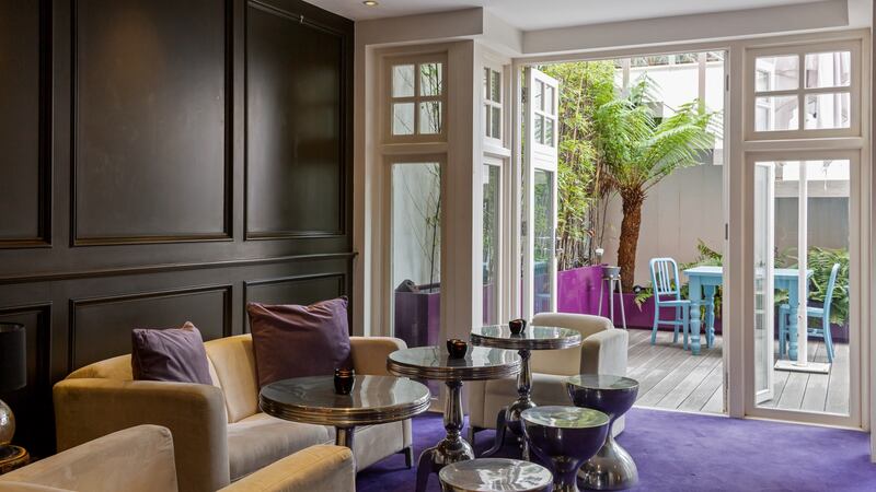Livingroom opening to sunken garden room