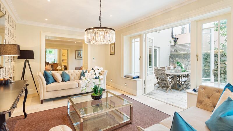 The basement has a further two livingrooms connected through a deep arch