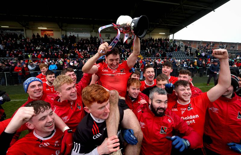 Fossa’s Paudie Clifford celebrates with the trophy after Fossa's victory over Kilmurry in the Munster junior championship final at Kilmurry. Photograph: Ryan Byrne/Inpho 
