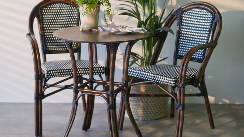 Paul Costelloe’s Living range for Dunnes Stores channels the cafes of Paris with its smart bentwood style seats.