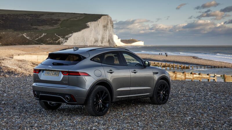 A raked rear window and large, overhanging spoiler  take some styling cues from Jaguar’s F-Type sports car