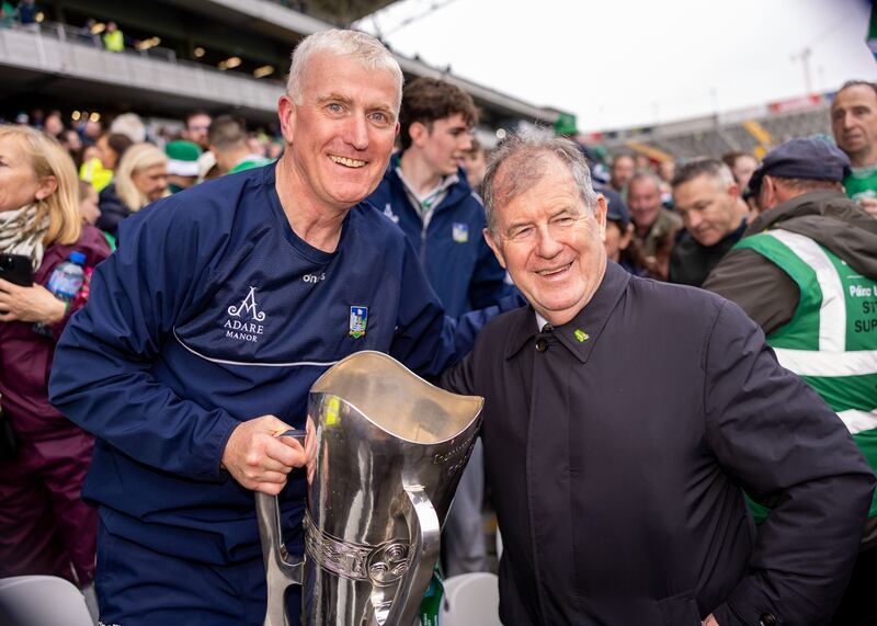 Limerick manager John Kiely celebrates winning the Munster hurling final with JP McManus. Photograph: Morgan Treacy/Inpho