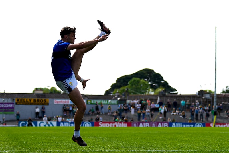 David Clifford kicks a sideline for Kerry. Photograph: James Lawlor/Inpho