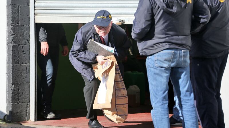 Members of the gardai, Customs, CAB, the Special Detective Unit and officers from the emergency response unit are taking part in a series of raids on homes in Dublin city centre on Friday. Photograph: Collins