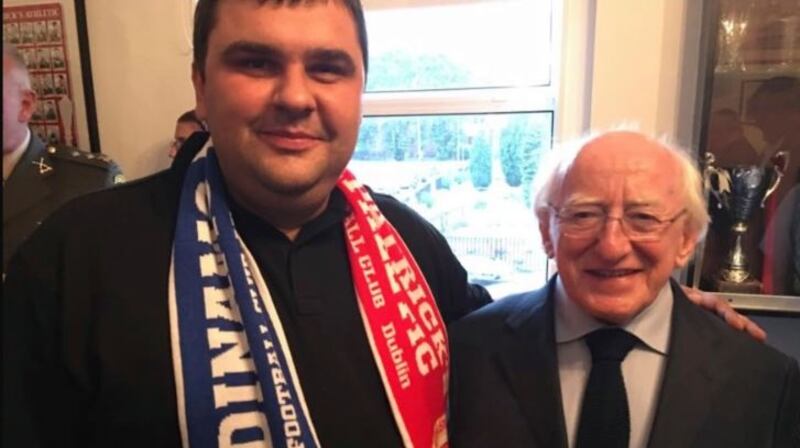 A photograph from Janis Kapteinis’s Facebook page showing him with President Michael D. Higgins at Richmond Park last July. Photograph: Facebook/Collins Courts