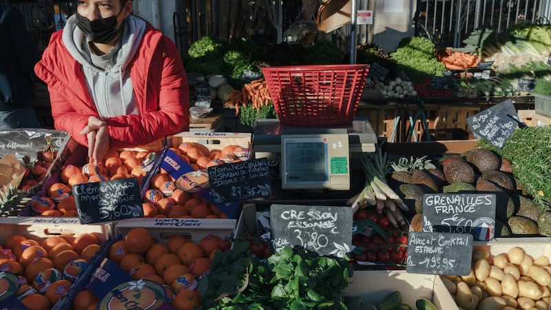 The Costaz stand at the Marché d’Aligre in Paris this week. The family has operated a greengrocer stand since 1905. Soaring inflation is starting to squeeze shopkeepers and consumers. Photograph: Andrea Mantovani/The New York Times