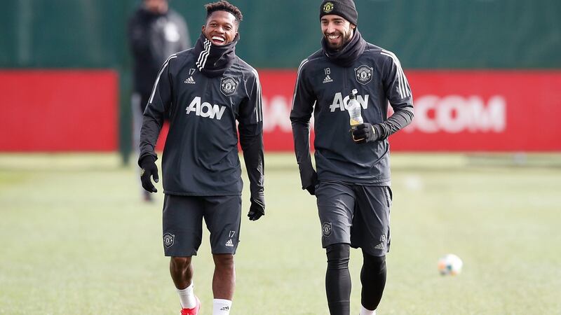 Manchester United’s Fred and Bruno Fernandes train ahead of Thursday night’s clash with LASK. Photograph: Martin Rickett/PA