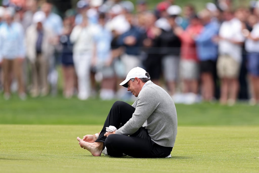 Rory McIlroy tends to his toe during his practice round at Aronimink on Wednesday ahead of the PGA Championship. Photograph: Andrew Redington/Getty Images
