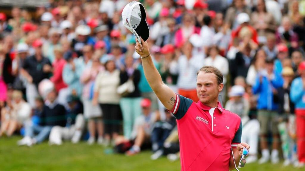England’s Danny Willett salutes the crowd after winning the Omega European Masters in Crans-Montana, Switzerland. Photograph: Peter Klaunzer/EPA