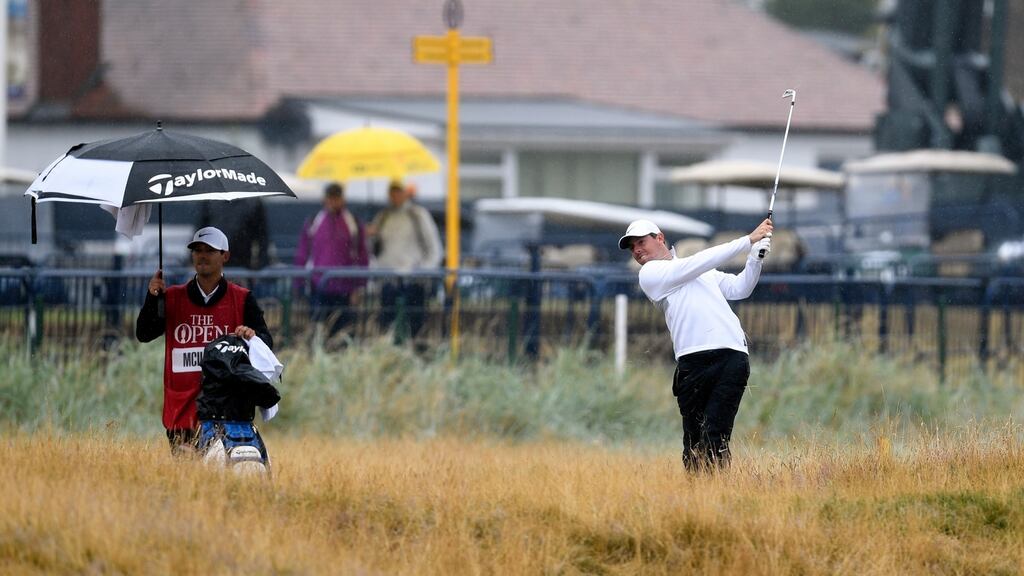 Rory McIlroy plays from the rough during the second round of the British Open at Carnoustie. Photo: Will Oliver/EPA