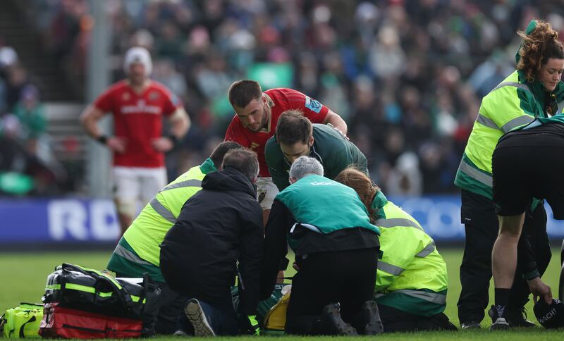 Munster's Alex Nankivell checks on Connacht's Cian Prendergast as he receives treatment. Photograph: James Crombie/Inpho