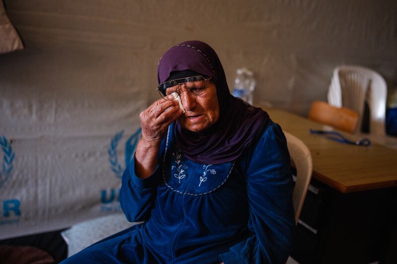 A displaced woman reacts as she sits in her room at a school being used as a shelter for displaced people in the southern Lebanese city of Tyre on Tuesday. Photograph: Dimitar Dilkoff/AFP via Getty