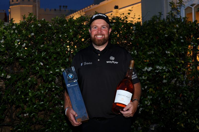 Shane Lowry poses for a photograph with the BMW PGA Championship trophy. Photograph: Andrew Redington/Getty