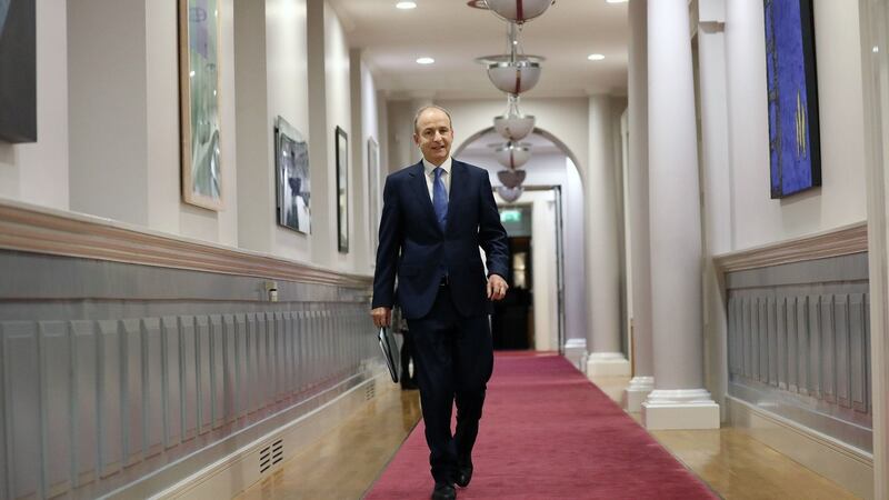 Taoiseach Micheal Martin arriving at Government Buildings in Dublin to address the nation on Monday. Photograph: Julien Behal Photography/PA