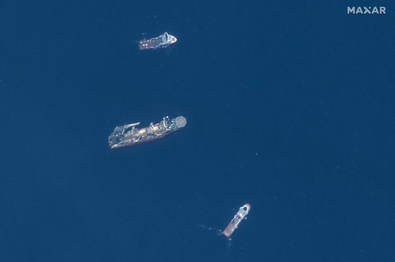 Ships that were part of the search for the Titan submersible near the wreck of the Titanic. The operation will be wound down, though some vehicles will still be deployed to continue to gather evidence. Satellite image: Maxar Technologies via The New York Times