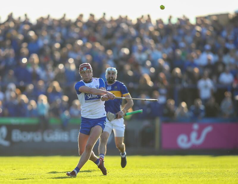 Waterford's Calum Lyons scores a point during the Munster SHC match against Tipperary at Walsh Park. Photograph: Ken Sutton/Inpho