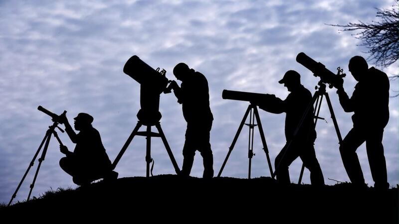 Members of the Galloway Forest Astronomical Society in Scotland prepare their equipment ahead of Friday’s solar eclipse. Photograph: Jeff J Mitchell/Getty Images
